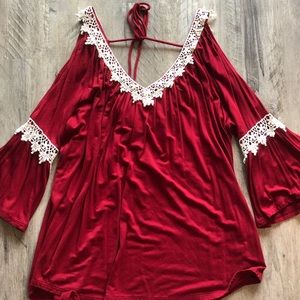 Red and cream colored top